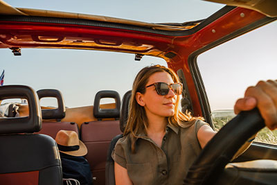 Young Woman driving a car